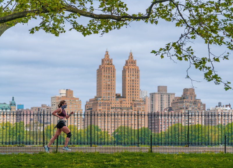 Running through a park.